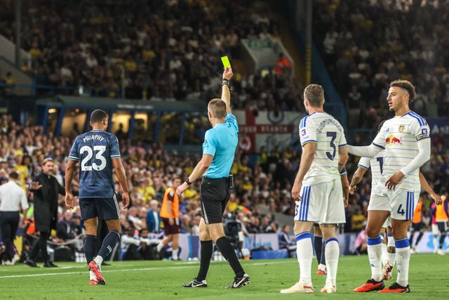 Referee Michael Salisbury gives a yellow card to Jacob Murphy of Newcastle United during the Premier League match Leeds United vs Newcastle Untied at Elland Road, Leeds, United Kingdom on 14 September 2026

(Photo by Alfie Cosgrove/News Images)