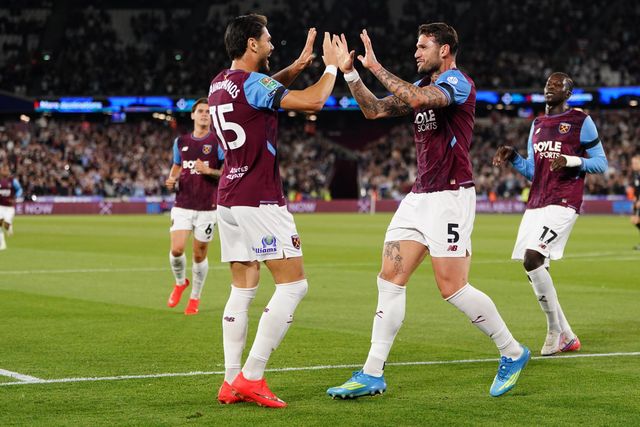 Konstantinos Mavropanos of West Ham United and Morato of West Ham United celebrate 1-1 leveller during the Carabao Cup round 3 match West Ham United vs Fulham at London Stadium, London, United Kingdom on 15 September 2026

(Photo by Harvey Murphy/News Images)