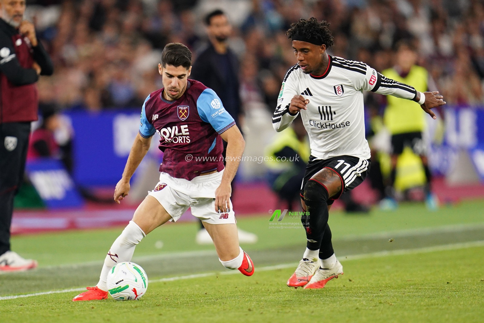 Manor Solomon of West Ham United and Kevin of Fulham during the Carabao Cup round 3 match West Ham United vs Fulham at London Stadium, London, United Kingdom on 15 September 2026

(Photo by Harvey Murphy/News Images)