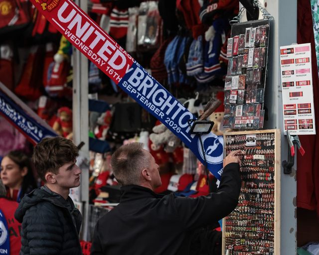Fans look to buy pin badges during the Carabao Cup round 3 match Manchester United vs Brighton & Hove Albion at Old Trafford, Manchester, United Kingdom on 16 September 2026

(Photo by Mark Cosgrove/News Images)