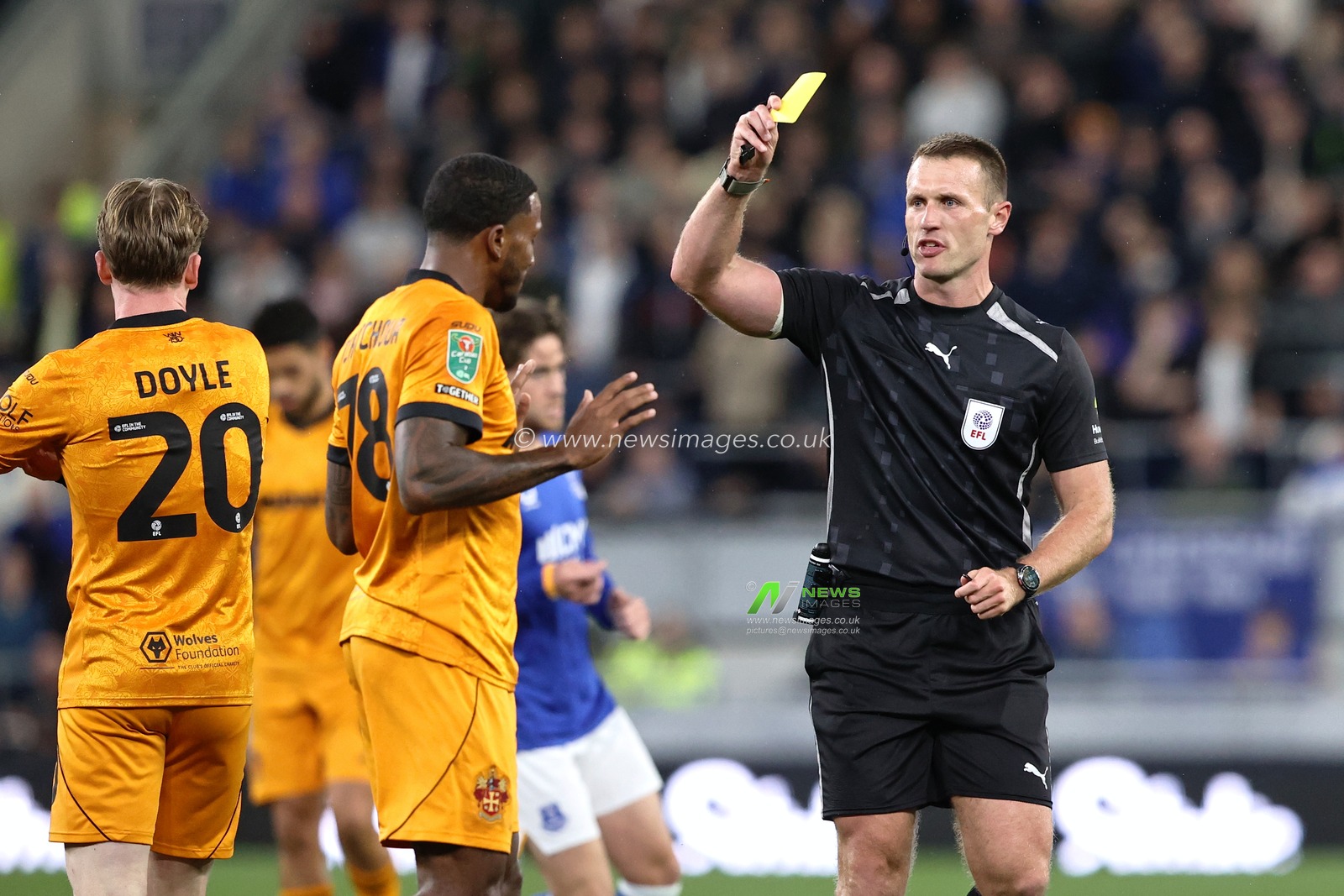 Jackson Tchatchoua of Wolverhampton Wanderers receives a yellow card during the Carabao Cup round 3 match Everton vs Wolverhampton Wanderers at Hill Dickinson Stadium, Liverpool, United Kingdom on 16 September 2026

(Photo by Alfie Cosgrove/News Images)