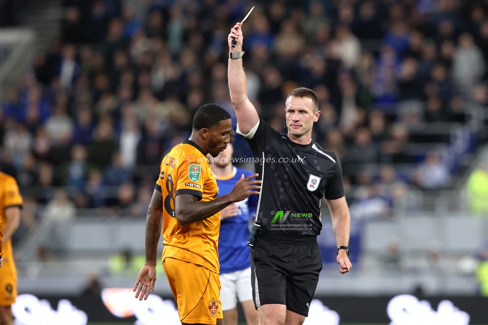 Jackson Tchatchoua of Wolverhampton Wanderers receives a yellow card during the Carabao Cup round 3 match Everton vs Wolverhampton Wanderers at Hill Dickinson Stadium, Liverpool, United Kingdom on 16 September 2026

(Photo by Alfie Cosgrove/News Images)