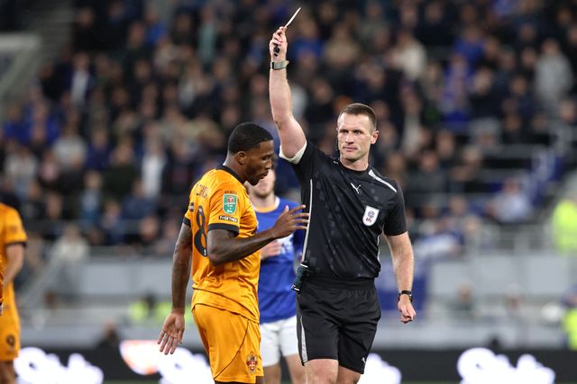 Jackson Tchatchoua of Wolverhampton Wanderers receives a yellow card during the Carabao Cup round 3 match Everton vs Wolverhampton Wanderers at Hill Dickinson Stadium, Liverpool, United Kingdom on 16 September 2026

(Photo by Alfie Cosgrove/News Images)