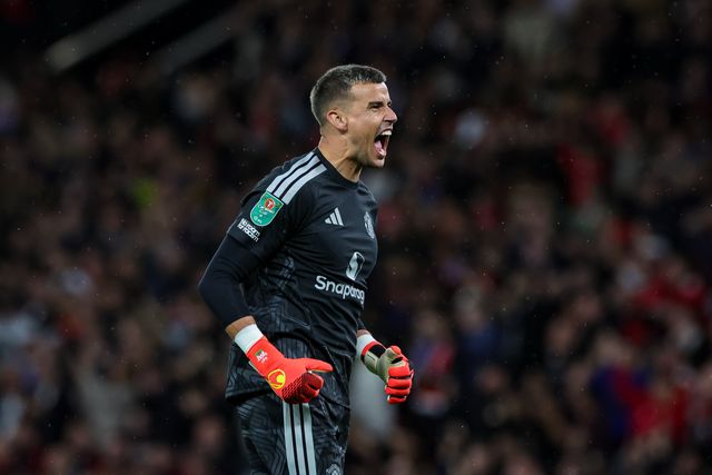 Manchester United goalkeeper Karl Darlow celebrates Shea Lacey of Manchester United scoring a goal to make it 1-0   during the Carabao Cup round 3 match Manchester United vs Brighton & Hove Albion at Old Trafford, Manchester, United Kingdom on 16 September 2026

(Photo by Mark Cosgrove/News Images)