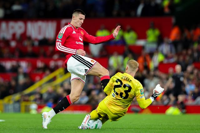 Brighton & Hove Albion goalkeeper Jason Steele slides in to win the ball from Benjamin Sesko of Manchester United during the Carabao Cup round 3 match Manchester United vs Brighton & Hove Albion at Old Trafford, Manchester, United Kingdom on 16 September 2026

(Photo by Mark Cosgrove/News Images)
