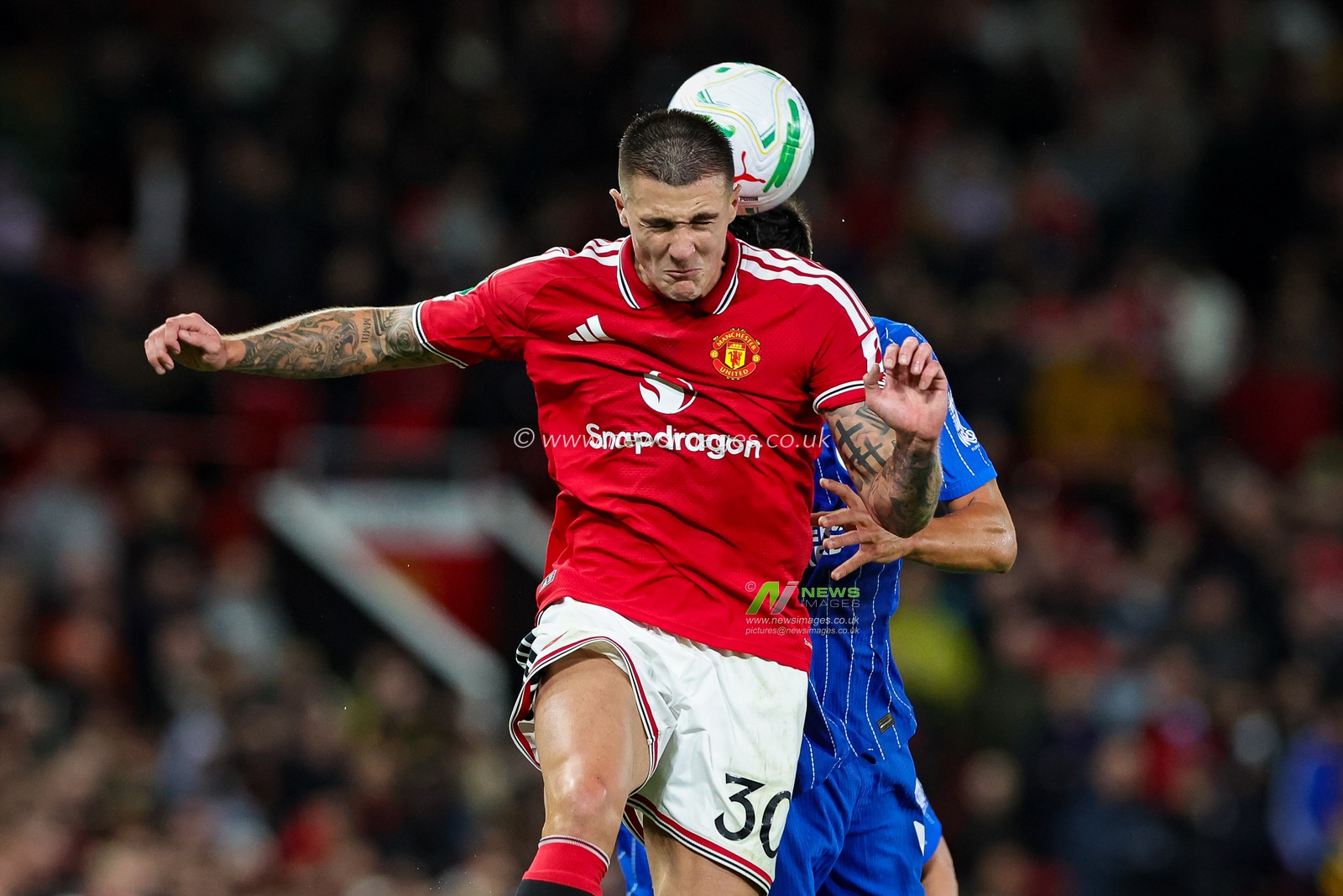 Benjamin Sesko of Manchester United leaps to head the ball during the Carabao Cup round 3 match Manchester United vs Brighton & Hove Albion at Old Trafford, Manchester, United Kingdom on 16 September 2026

(Photo by Mark Cosgrove/News Images)