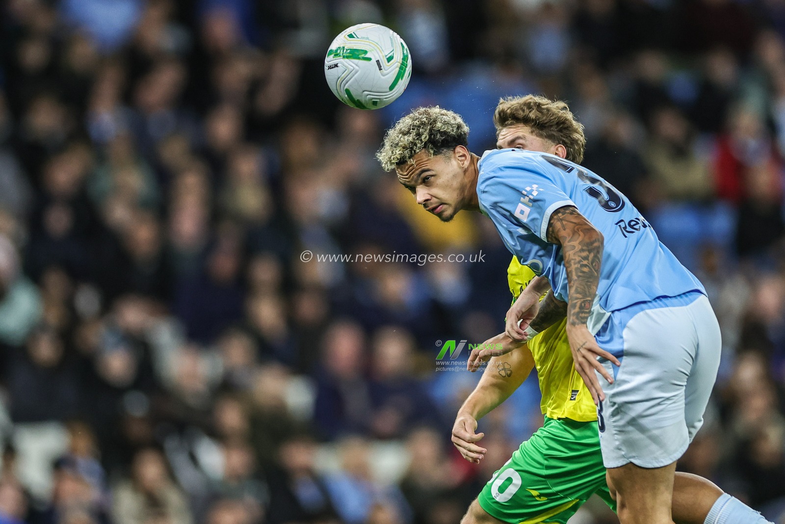 Nico O'Reilly of Manchester City jumps up to win the high ball during the Carabao Cup round 3 match Manchester City vs Norwich City at Etihad Stadium, Manchester, United Kingdom on 17 September 2026

(Photo by Mark Cosgrove/News Images)