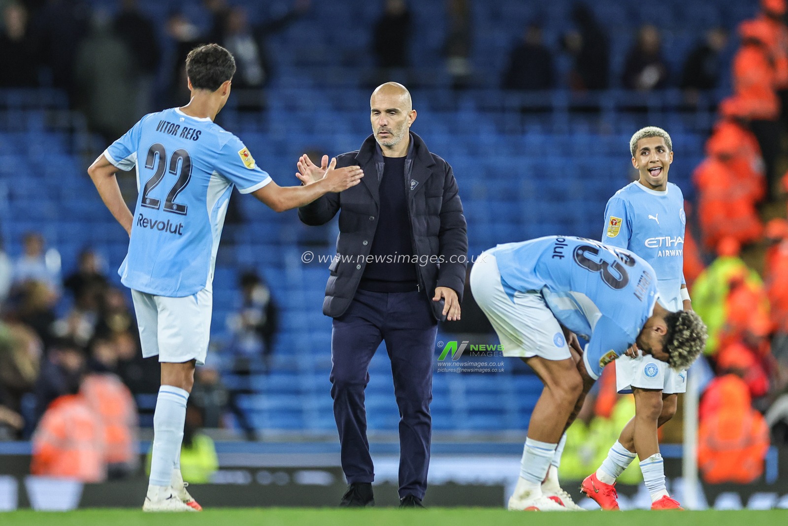 Vitor Reis of Manchester City shakes hands with Enzo Maresca manager of Manchester City after the game during the Carabao Cup round 3 match Manchester City vs Norwich City at Etihad Stadium, Manchester, United Kingdom on 17 September 2026

(Photo by Mark Cosgrove/News Images)