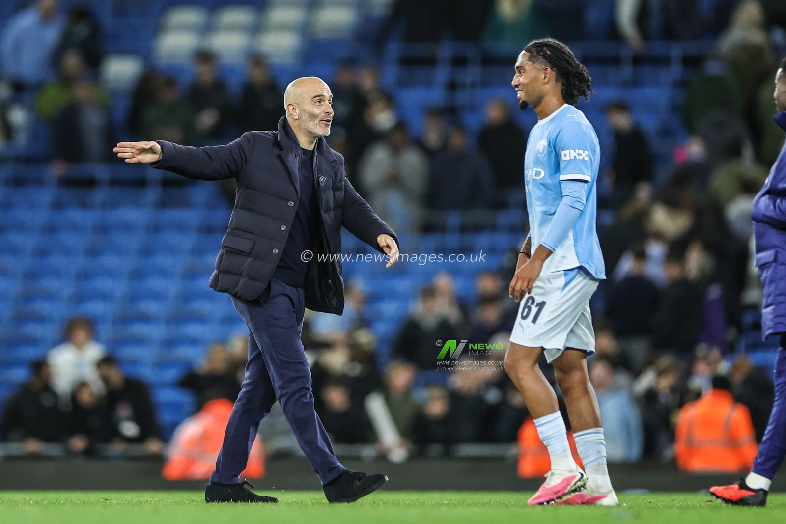 Enzo Maresca manager of Manchester City celebrates the win with Kaden Braithwaite of Manchester City during the Carabao Cup round 3 match Manchester City vs Norwich City at Etihad Stadium, Manchester, United Kingdom on 17 September 2026

(Photo by Mark Cosgrove/News Images)