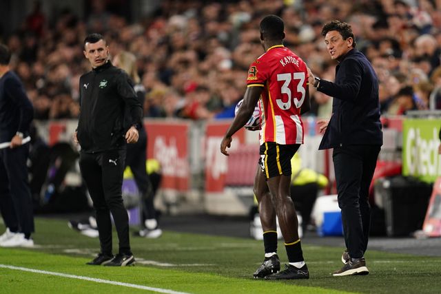 Keith Andrews manager of Brentford and Michael Kayode of Brentford during the Premier League match Brentford vs Chelsea at GTECH Community Stadium, London, United Kingdom on 18 September 2026

(Photo by Harvey Murphy/News Images)