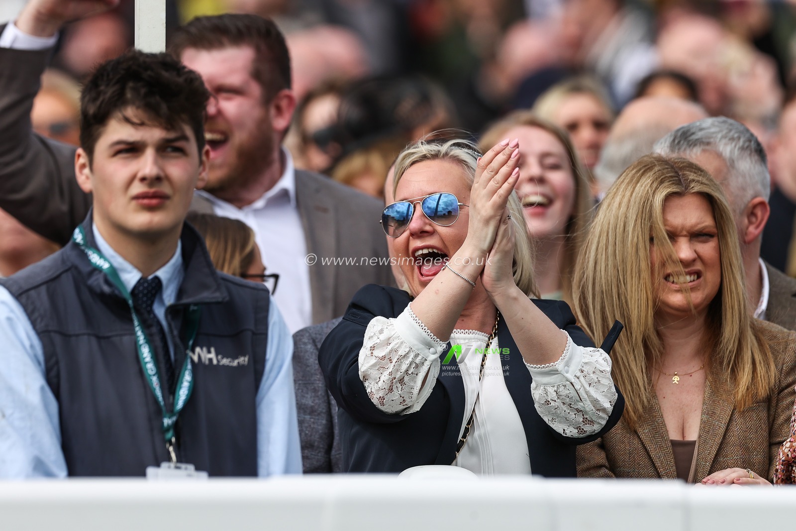 Racegoers celebrate Il Etait Temps ridden by Paul Townend winning the 1.45pm The Close Brothers Manifesto Novicesâ€™ Steeple Chase (Class 1) during the Randox Grand National 2024 Opening Day at Aintree Racecourse, Liverpool, United Kingdom, 11th April 2024

(Photo by Mark Cosgrove/News Images)
