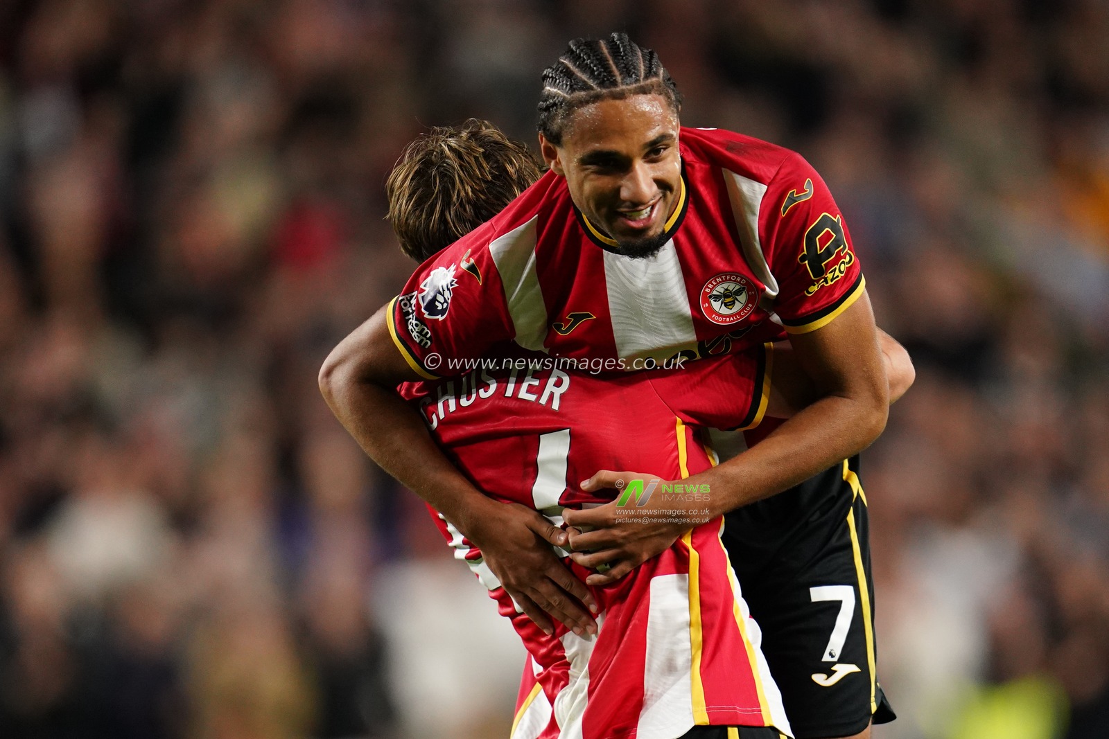 Jannik Schuster of Brentford and Kevin Schade of Brentford celebrate third goal during the Premier League match Brentford vs Chelsea at GTECH Community Stadium, London, United Kingdom on 18 September 2026

(Photo by Harvey Murphy/News Images)