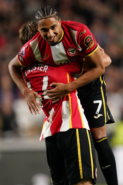 Jannik Schuster of Brentford and Kevin Schade of Brentford celebrate third goal during the Premier League match Brentford vs Chelsea at GTECH Community Stadium, London, United Kingdom on 18 September 2026

(Photo by Harvey Murphy/News Images)