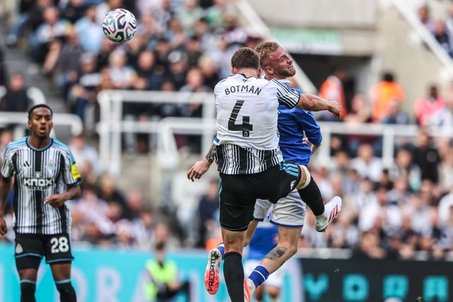 Oliver McBurnie of Hull City jumps up to win the high ball from Sven Botman of Newcastle United during the Premier League match Newcastle Untied vs Hull City at St. James's Park, Newcastle, United Kingdom on 19 September 2026

(Photo by Alfie Cosgrove/News Images)