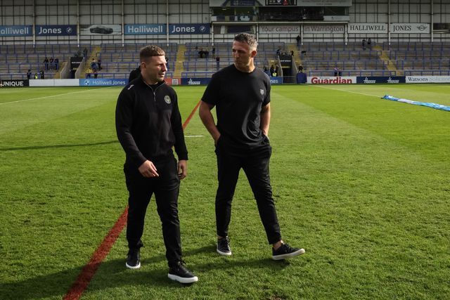 George Williams of Warrington Wolves and Sam Burgess manager of Warrington Wolves during the Betfred Super League Play-off Eliminator round match Warrington Wolves vs Hull KR at The Halliwell Jones Stadium, Warrington, United Kingdom on 19 September 2026

(Photo by Mark Cosgrove/News Images)