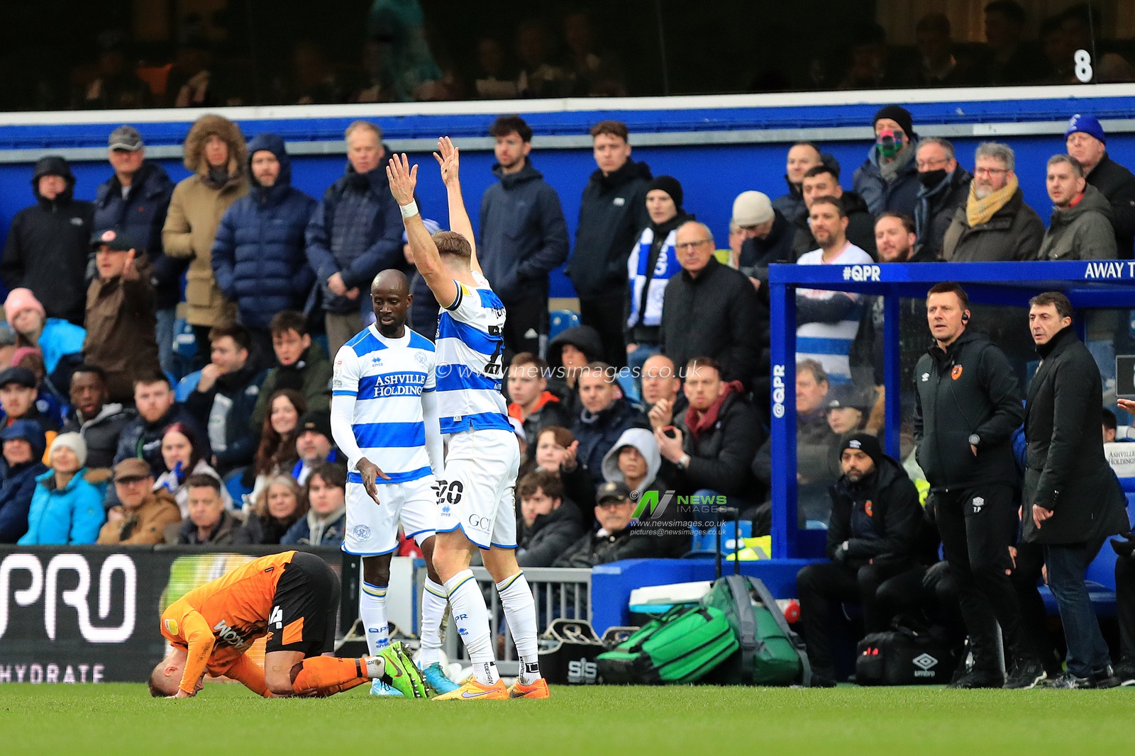 Marcus Forss #44 of Hull City and Jimmy Dunne #20 of Queens Park Rangers clash.