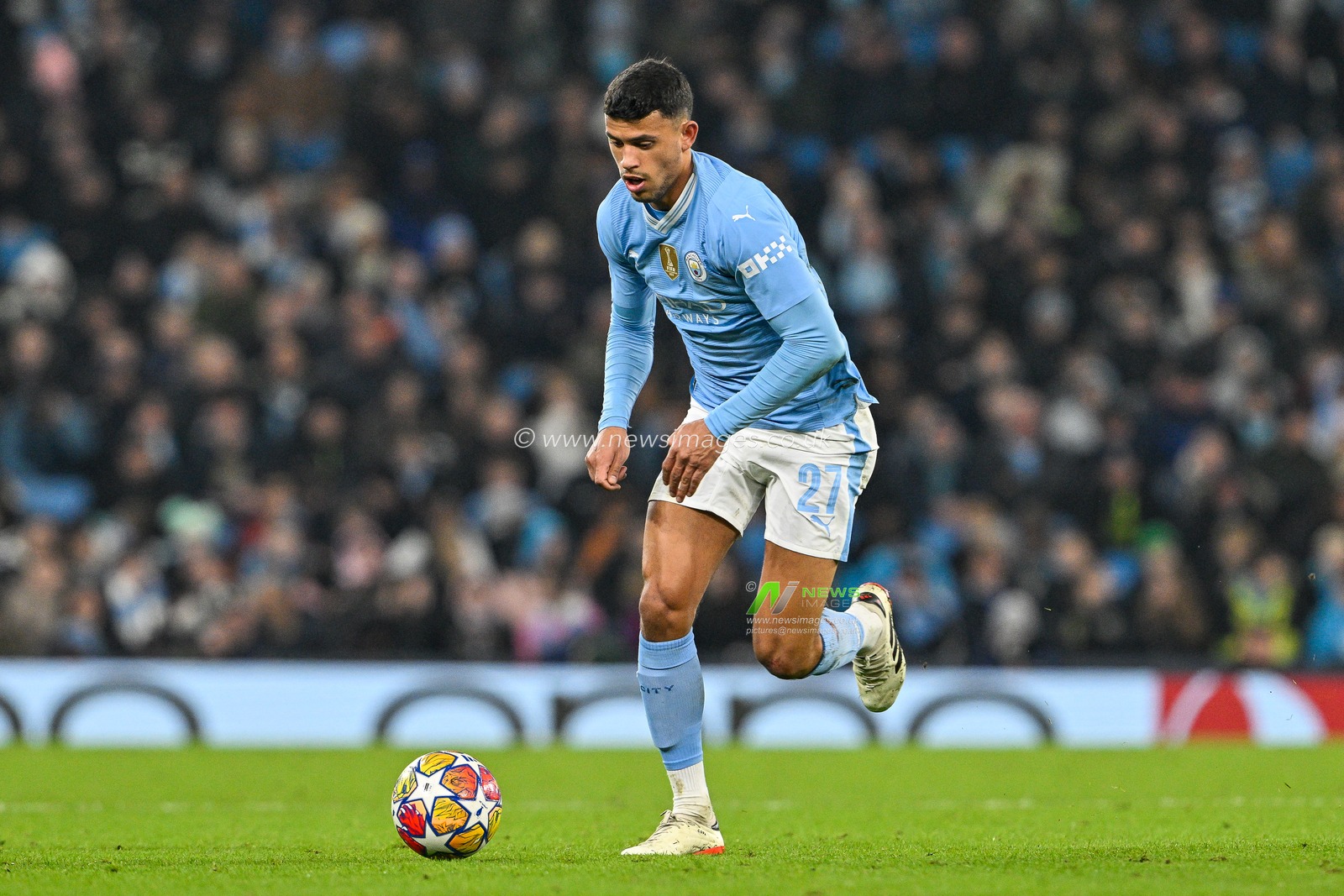 Matheus Nunes of Manchester City makes a break with the ball during the UEFA Champions League match Manchester City vs F.C. Copenhagen at Etihad Stadium, Manchester, United Kingdom, 6th March 2024

(Photo by Cody Froggatt/News Images)