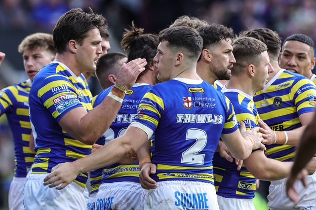 Ben Currie of Warrington Wolves celebrates his try with team mates during the Betfred Super League Play-off Eliminator round match Warrington Wolves vs Hull KR at The Halliwell Jones Stadium, Warrington, United Kingdom on 19 September 2026

(Photo by Mark Cosgrove/News Images)
