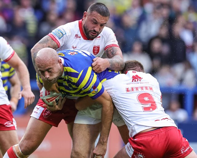 James Harrison of Warrington Wolves is tackled by Elliot Minchella of Hull KR and Jez Litten of Hull KR during the Betfred Super League Play-off Eliminator round match Warrington Wolves vs Hull KR at The Halliwell Jones Stadium, Warrington, United Kingdom on 19 September 2026

(Photo by Mark Cosgrove/News Images)