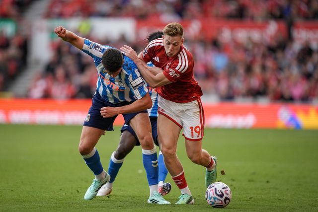 Liam Delap of Nottingham Forest battles for the ball  with Bobby Thomas of Coventry City and Caleb Yirenkyi of Coventry City during the Premier League match Nottingham Forest vs Coventry City at City Ground, Nottingham, United Kingdom on 19 September 2026

(Photo by Maynard Manyowa/News Images)
