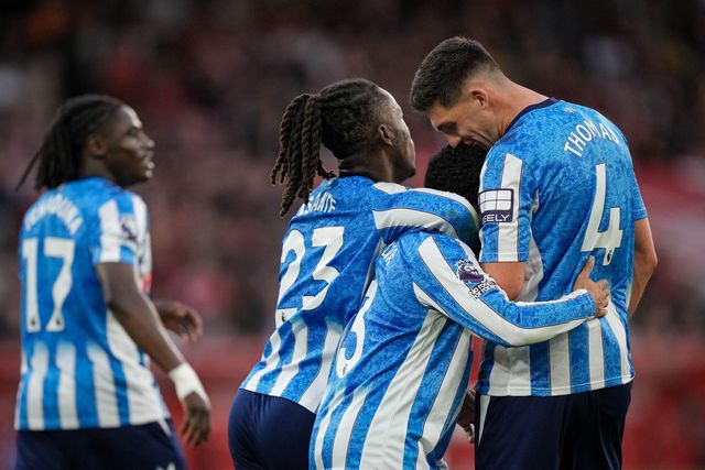 Jay Dasilva of Coventry City celebrates his goal to make it  0-1 with Brandon Thomas-Asante of Coventry City and Bobby Thomas of Coventry City  during the Premier League match Nottingham Forest vs Coventry City at City Ground, Nottingham, United Kingdom on 19 September 2026

(Photo by Maynard Manyowa/News Images)