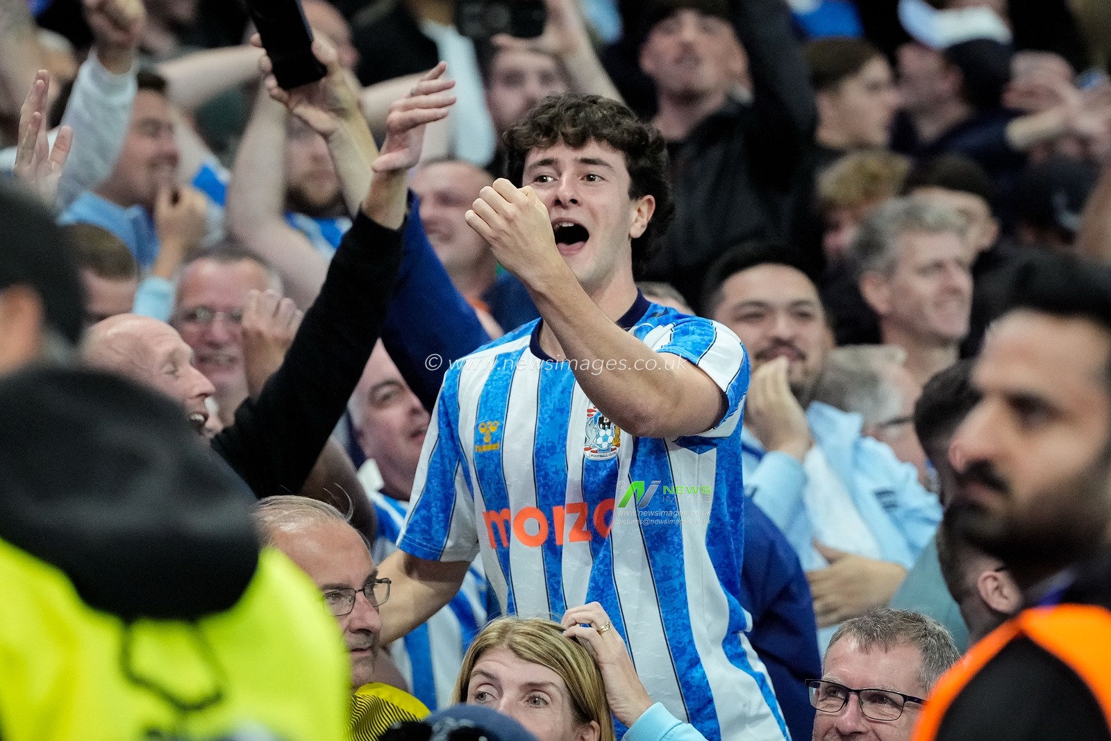 Coventry fans celebrate after Referee Jarred Gillett disallows Igor Jesus of Nottingham Forest goal after referral from Video assistant referee Paul Howard during the Premier League match Nottingham Forest vs Coventry City at City Ground, Nottingham, United Kingdom on 19 September 2026

(Photo by Maynard Manyowa/News Images)