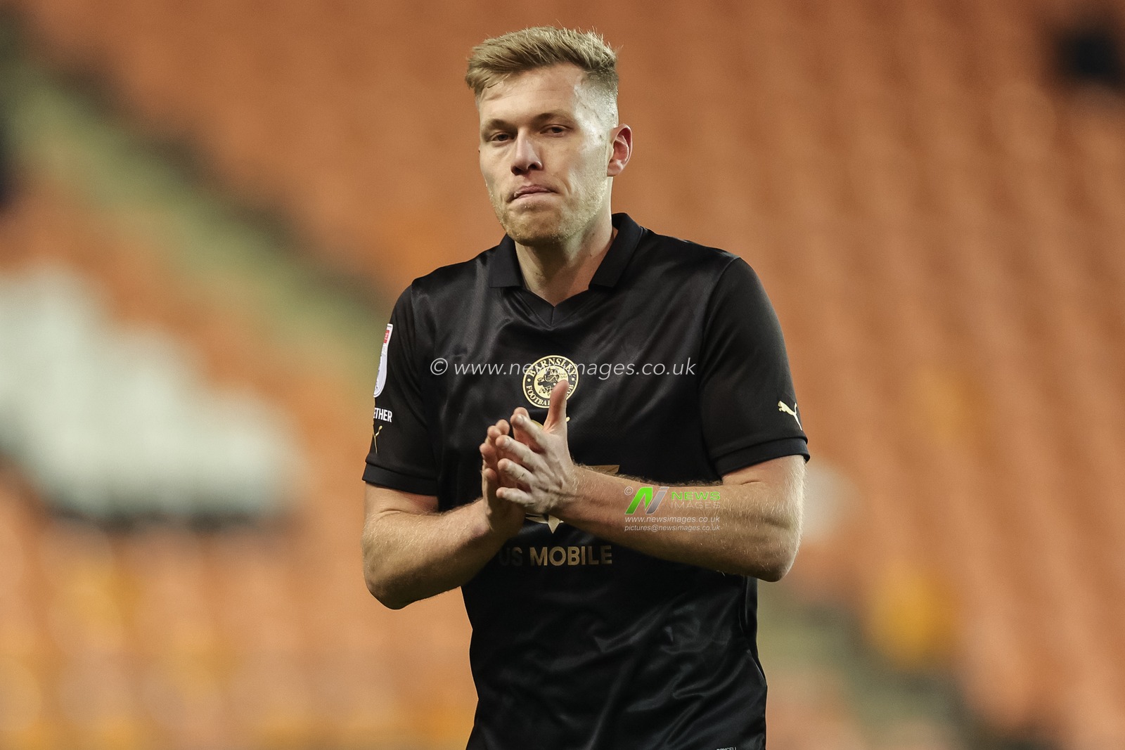 Sam Cosgrove #9 of Barnsley applauds the fans as heâ€™s substituted during the Bristol Street Motors Trophy match Blackpool vs Barnsley at Bloomfield Road, Blackpool, United Kingdom, 5th December 2023

(Photo by Mark Cosgrove/News Images)
