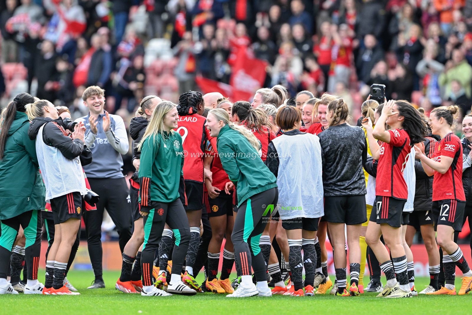 Manchester United celebrate the full time result, during the Adobe Women's FA Cup Semi-Final match Manchester United Women vs Chelsea FC Women at Leigh Sports Village, Leigh, United Kingdom, 14th April 2024

(Photo by Cody Froggatt/News Images)