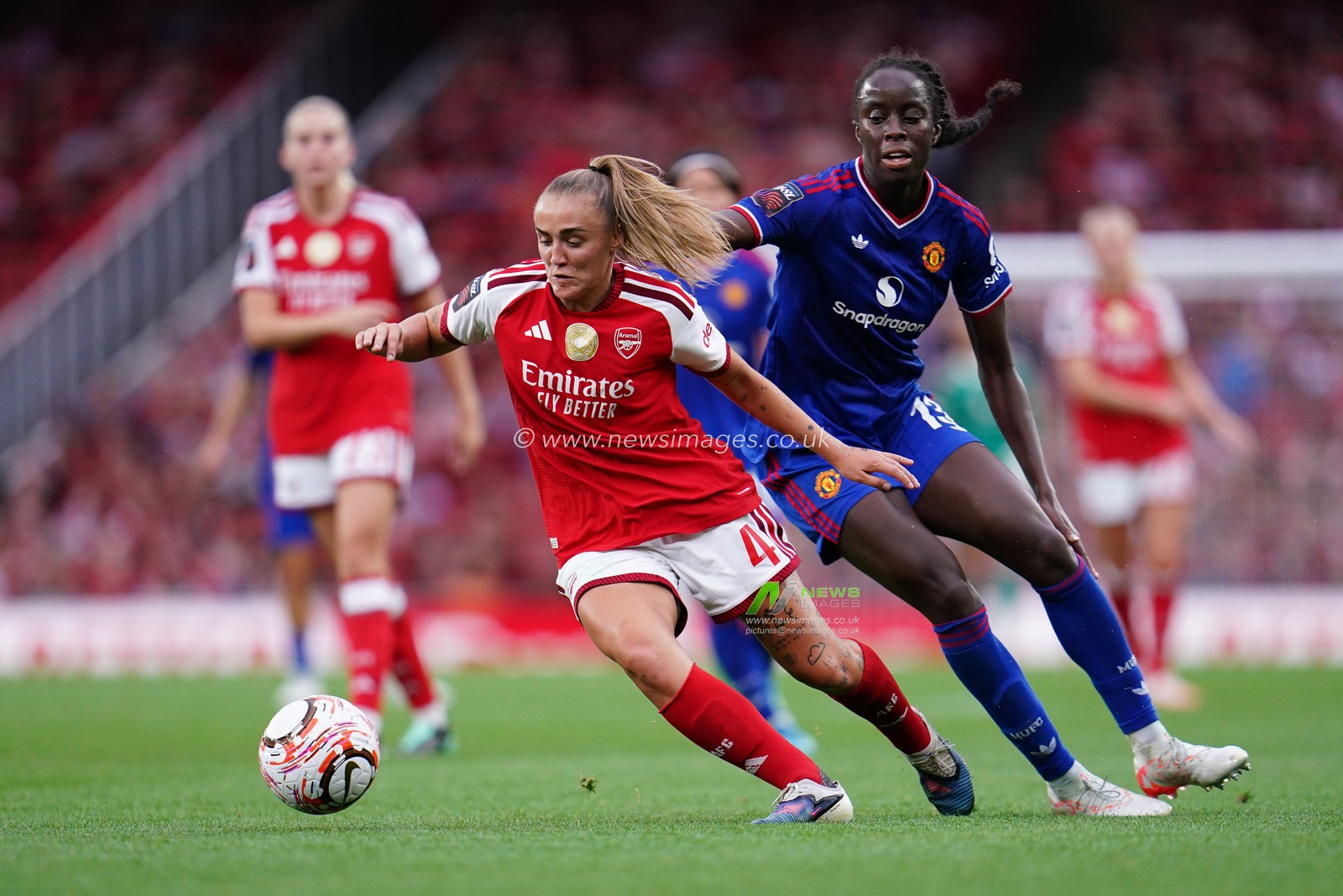 Georgia Stanway of Arsenal on the ball under pressure during the Women's Super League match Arsenal vs Manchester United at Emirates, London, United Kingdom on 19 September 2026

(Photo by Harvey Murphy/News Images)
