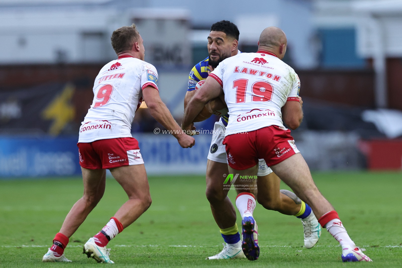 Kelepi Tanginoa of Warrington Wolves is tackled by Karl Lawton of Hull KR during the Betfred Super League Play-off Eliminator round match Warrington Wolves vs Hull KR at The Halliwell Jones Stadium, Warrington, United Kingdom on 19 September 2026

(Photo by Mark Cosgrove/News Images)