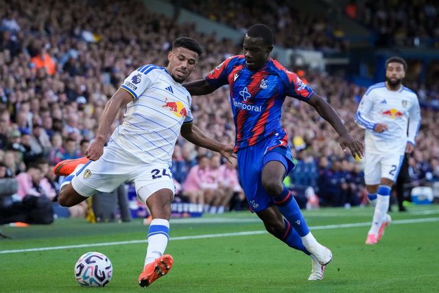James Justin of Leeds United battles for the ball  with Tyrick Mitchell of Crystal Palace during the Premier League match Leeds United vs Crystal Palace at Elland Road, Leeds, United Kingdom on 20 September 2026

(Photo by Maynard Manyowa/News Images)