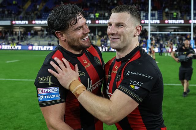 Joe Philbin of Warrington Wolves and George Williams of Warrington Wolves celebrate the win during the Betfred Super League Play-off Semi-Final match Leeds Rhinos vs Warrington Wolves at AMT Headingley Stadium, Leeds, United Kingdom on 25 September 2026

(Photo by Mark Cosgrove/News Images)