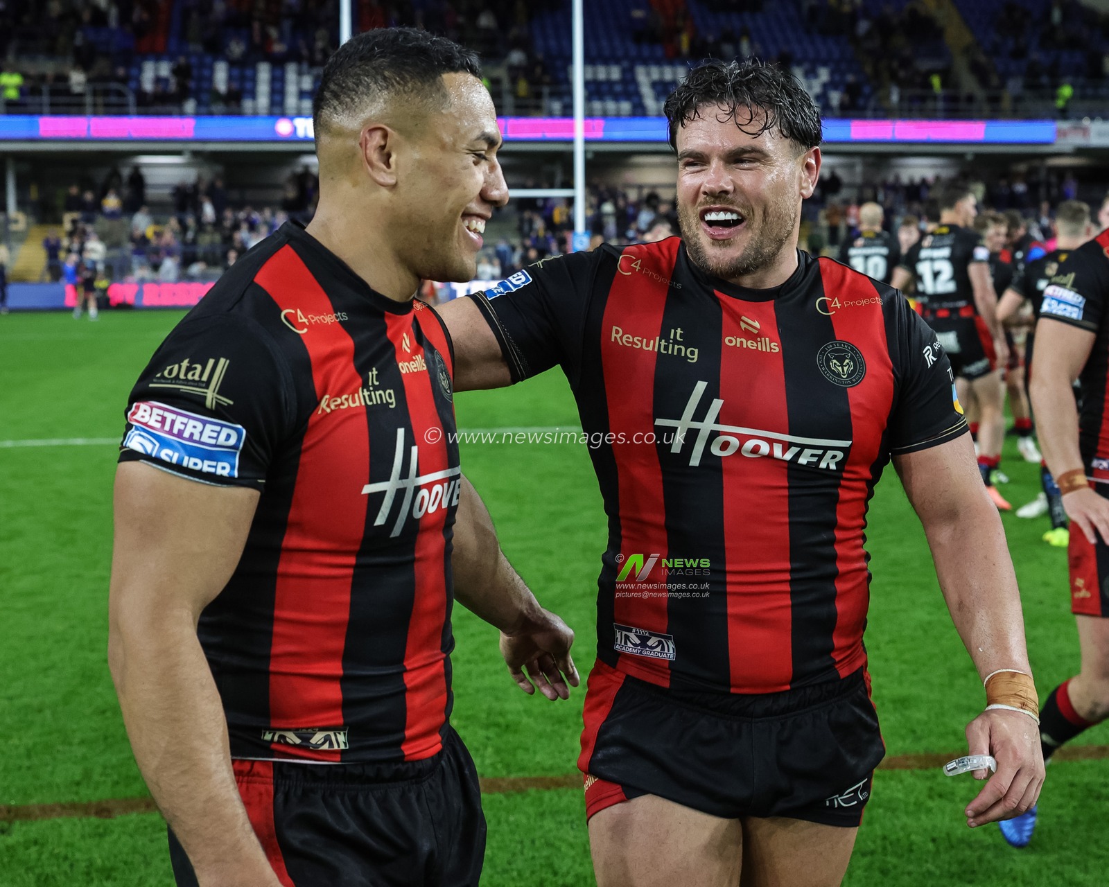 Albert Hopoate of Warrington Wolves and Joe Philbin of Warrington Wolves celebrate the win during the Betfred Super League Play-off Semi-Final match Leeds Rhinos vs Warrington Wolves at AMT Headingley Stadium, Leeds, United Kingdom on 25 September 2026

(Photo by Mark Cosgrove/News Images)