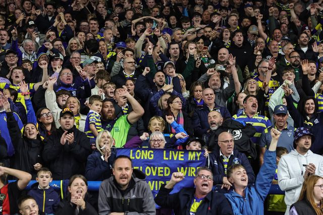 Warrington fans celebrate the win as they book their place in the final at Old Trafford during the Betfred Super League Play-off Semi-Final match Leeds Rhinos vs Warrington Wolves at AMT Headingley Stadium, Leeds, United Kingdom on 25 September 2026

(Photo by Mark Cosgrove/News Images)