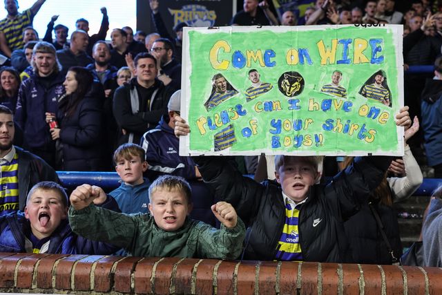 Warrington fans celebrate the win as they book their place in the final at Old Trafford during the Betfred Super League Play-off Semi-Final match Leeds Rhinos vs Warrington Wolves at AMT Headingley Stadium, Leeds, United Kingdom on 25 September 2026

(Photo by Mark Cosgrove/News Images)