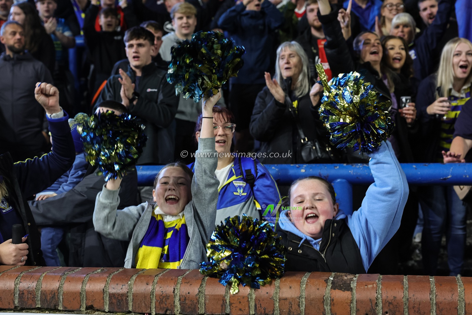 Warrington fans celebrate the win as they book their place in the final at Old Trafford during the Betfred Super League Play-off Semi-Final match Leeds Rhinos vs Warrington Wolves at AMT Headingley Stadium, Leeds, United Kingdom on 25 September 2026

(Photo by Mark Cosgrove/News Images)