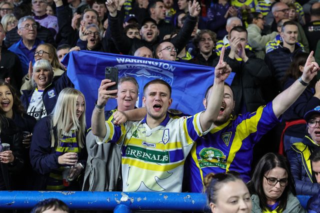Warrington fans celebrate the win as they book their place in the final at Old Trafford during the Betfred Super League Play-off Semi-Final match Leeds Rhinos vs Warrington Wolves at AMT Headingley Stadium, Leeds, United Kingdom on 25 September 2026

(Photo by Mark Cosgrove/News Images)
