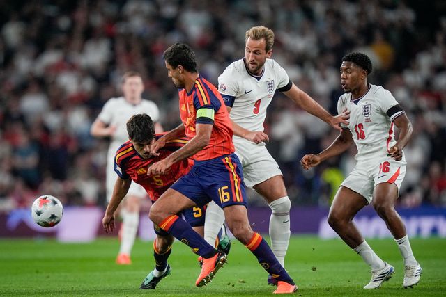 Harry Kane of England battles for the ball  with Rodri of Spain and Pau Cubarsí of Spain during the UEFA Nations League match England vs Spain at Wembley Stadium, London, United Kingdom on 26 September 2026

(Photo by Maynard Manyowa/News Images)
