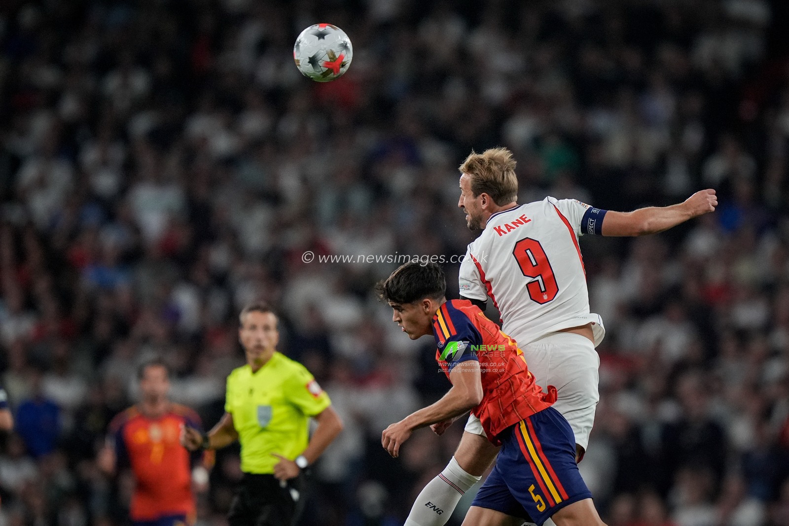 Harry Kane of England jumps up to win the high ball  from Pau Cubarsí of Spain during the UEFA Nations League match England vs Spain at Wembley Stadium, London, United Kingdom on 26 September 2026

(Photo by Maynard Manyowa/News Images)
