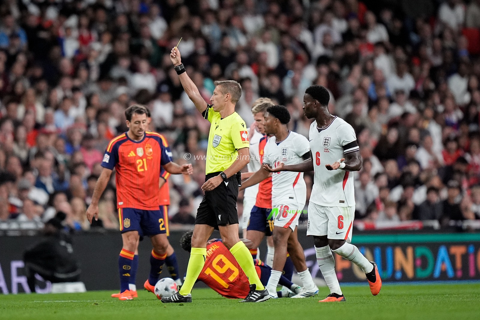 Referee Davide Massa gives a yellow card to  Marc Guéhi of England during the UEFA Nations League match England vs Spain at Wembley Stadium, London, United Kingdom on 26 September 2026

(Photo by Maynard Manyowa/News Images)