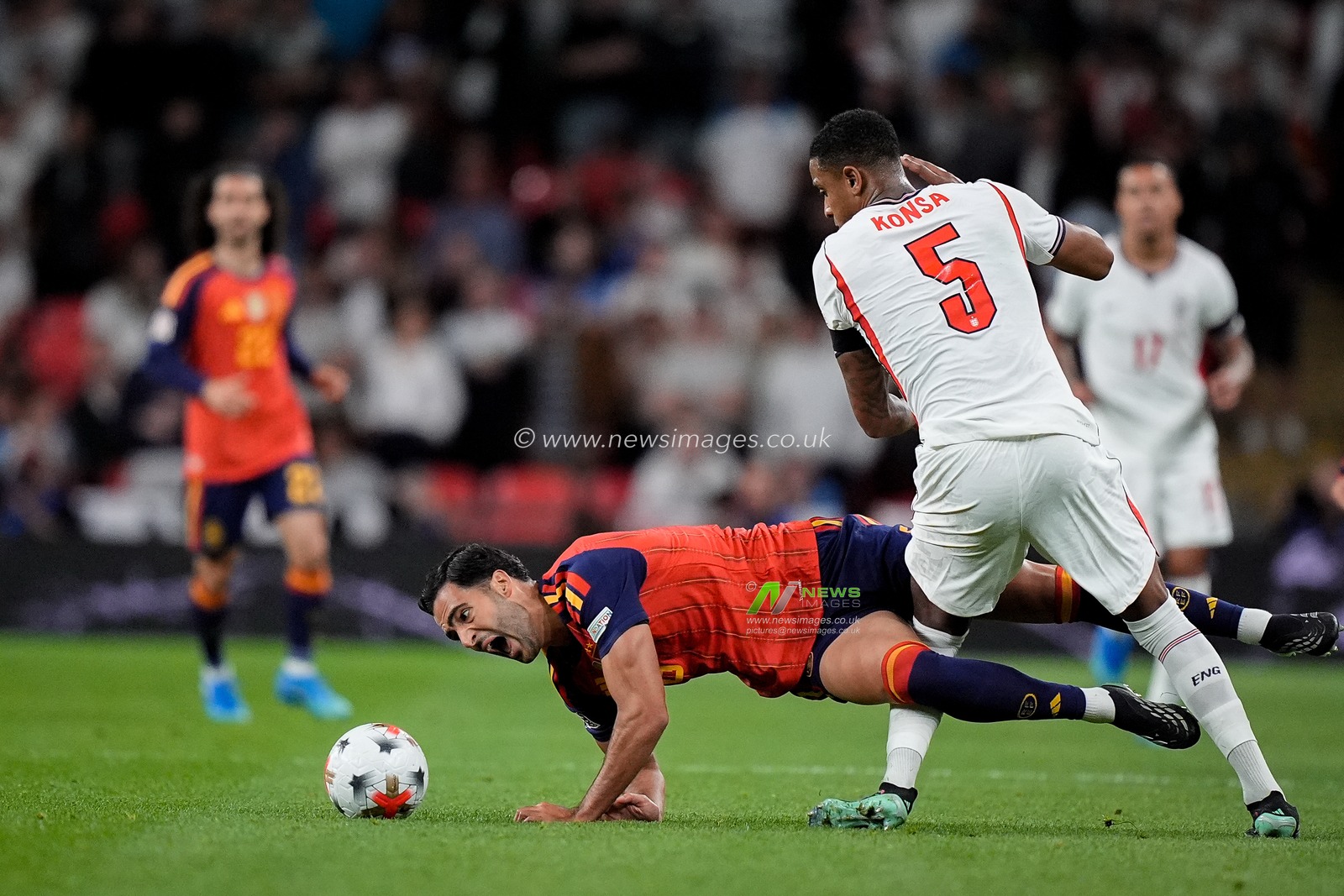 Mikel Merino of Spain is tackled by  Ezri Konsa of England during the UEFA Nations League match England vs Spain at Wembley Stadium, London, United Kingdom on 26 September 2026

(Photo by Maynard Manyowa/News Images)