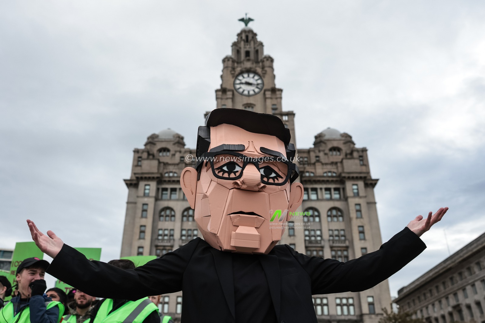 A young activist wearing a Papier-mache Andy Burnham The UK Prime Minister head protests outside the Royal Liver Building during the Labour Party Annual Conference 2026 at Convention Centre, Liverpool, United Kingdom on 27 September 2026

(Photo by Mark Cosgrove/News Images)