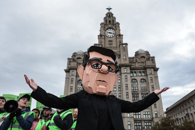 A young activist wearing a Papier-mache Andy Burnham The UK Prime Minister head protests about jobs for our future with colleagues during the Labour Party Annual Conference 2026 at Convention Centre, Liverpool, United Kingdom on 27 September 2026

(Photo by Mark Cosgrove/News Images)