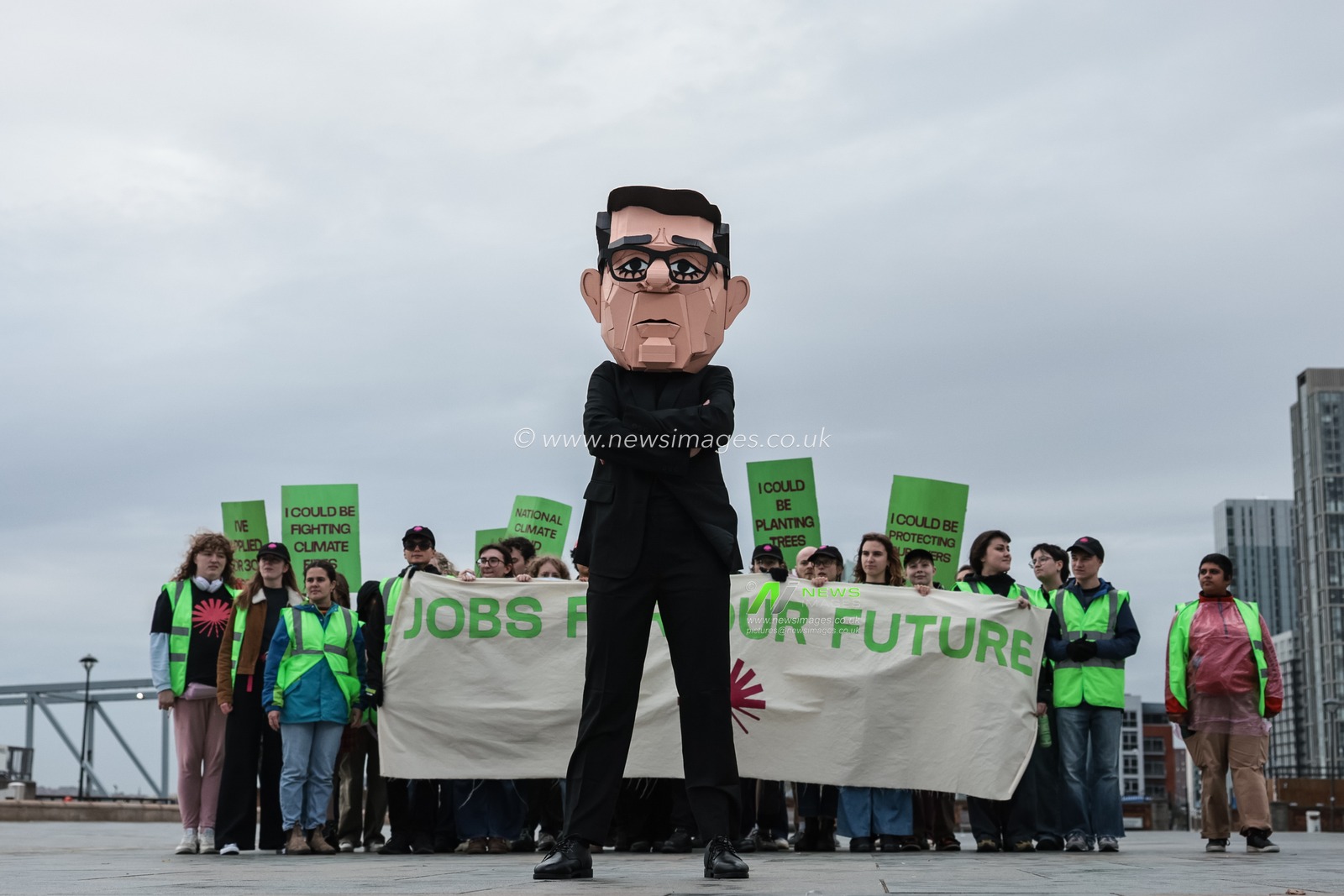 A young activist wearing a Papier-mache Andy Burnham The UK Prime Minister head protests about jobs for our future with colleagues during the Labour Party Annual Conference 2026 at Convention Centre, Liverpool, United Kingdom on 27 September 2026

(Photo by Mark Cosgrove/News Images)
