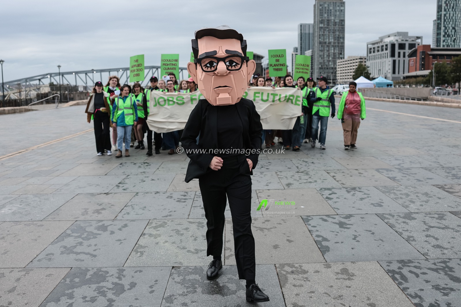 A young activist wearing a Papier-mache Andy Burnham The UK Prime Minister head protests about jobs for our future with colleagues during the Labour Party Annual Conference 2026 at Convention Centre, Liverpool, United Kingdom on 27 September 2026

(Photo by Mark Cosgrove/News Images)