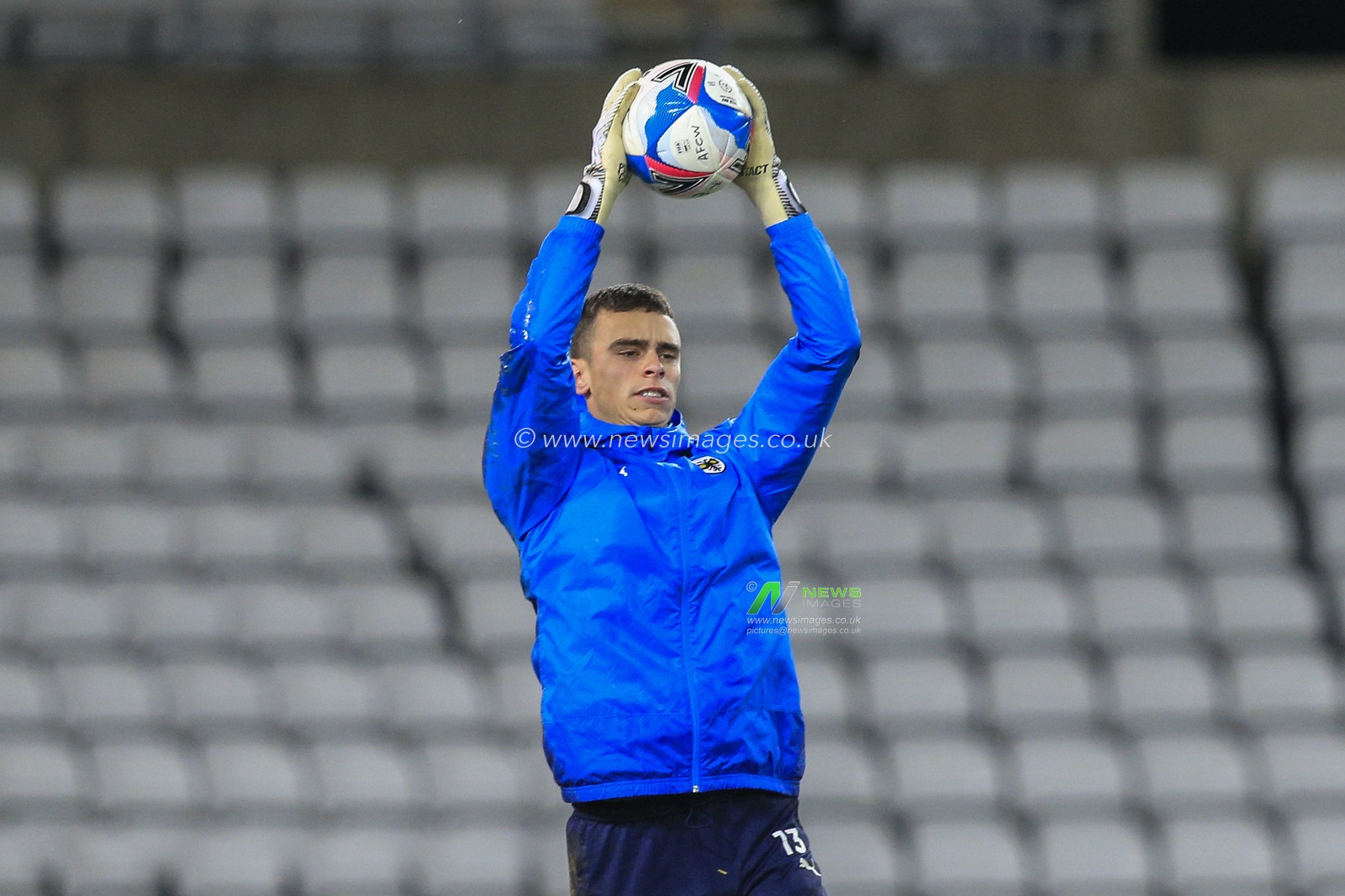 Nik Tzanev #13 of AFC Wimbledon during the pre-game warmup