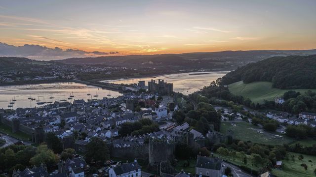 A spectacular sunrise breaks over the historic Conwy Castle, bathing the medieval fortress and surrounding landscape in dramatic golden light in Conwy, Wales, United Kingdom, on 3 October 2026.

(Photo by Mark Cosgrove/News Images)