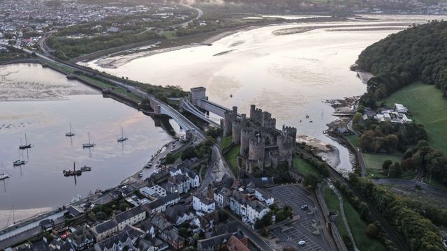 A spectacular sunrise breaks over the historic Conwy Castle, bathing the medieval fortress and surrounding landscape in dramatic golden light in Conwy, Wales, United Kingdom, on 3 October 2026.

(Photo by Mark Cosgrove/News Images)