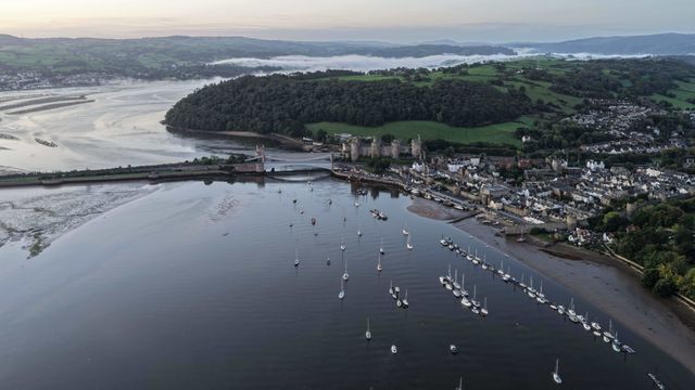 A spectacular sunrise breaks over the historic Conwy Castle, bathing the medieval fortress and surrounding landscape in dramatic golden light in Conwy, Wales, United Kingdom, on 3 October 2026.

(Photo by Mark Cosgrove/News Images)