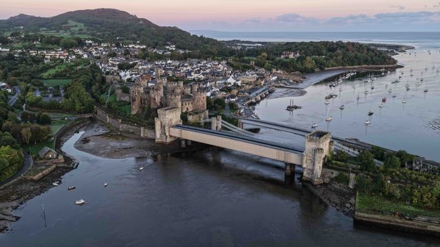 A spectacular sunrise breaks over the historic Conwy Castle, bathing the medieval fortress and surrounding landscape in dramatic golden light in Conwy, Wales, United Kingdom, on 3 October 2026.

(Photo by Mark Cosgrove/News Images)